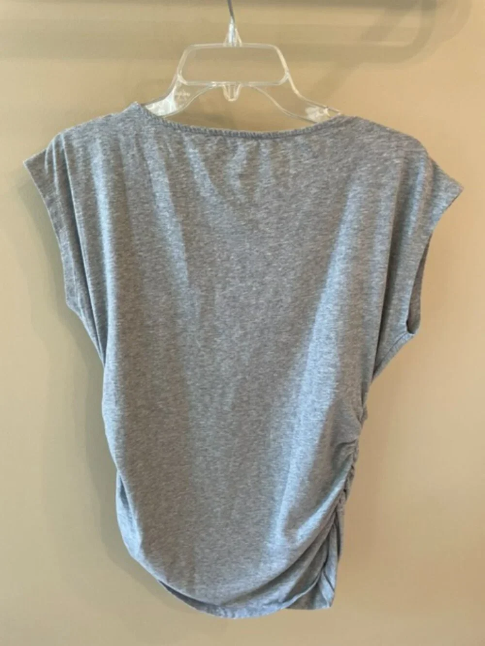 Women's Michael Kors jersey with zip shoulders and side rushing. Size large